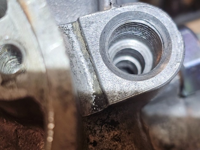 Logement joint radiateur d'huile